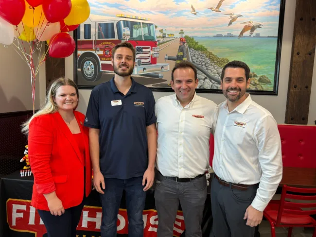 Firehouse Subs team members and franchise leaders celebrate the grand opening of the brand’s 1,400th restaurant in Clearwater, Florida — a milestone moment in the chain’s nationwide growth story.