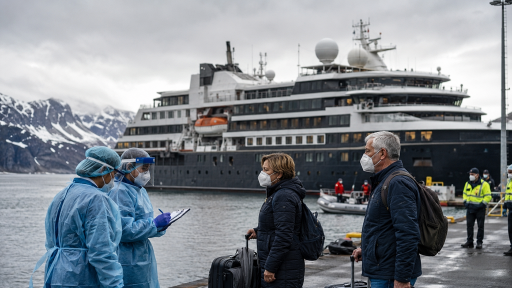 Representative image: Health workers screen masked cruise passengers at a cold-weather port as authorities trace a rare hantavirus-linked illness cluster tied to an expedition cruise ship, highlighting why the WHO says the rodent-borne virus outbreak is serious but not the start of a new pandemic.