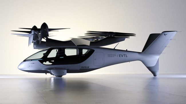Vertical Aerospace's official unveiling of the Valo aircraft, shown here in its full-scale prototype form. The company is now developing a hybrid-electric variant to extend range and mission flexibility, marking a strategic pivot toward commercial viability in long-range eVTOL operations. Image courtesy: Vertical Aerospace.