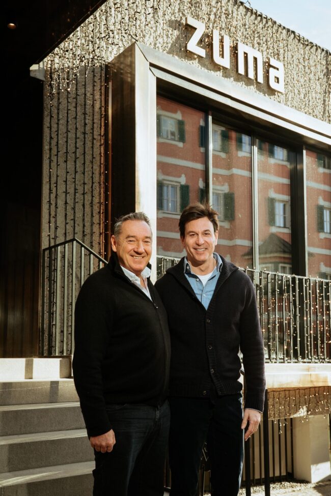 Sven Koch of Azumi Ltd and Toto Wolff of Mercedes-AMG PETRONAS F1 Team formalize a first-of-its-kind hospitality alliance that could reshape how luxury dining integrates with elite motorsport experiences.