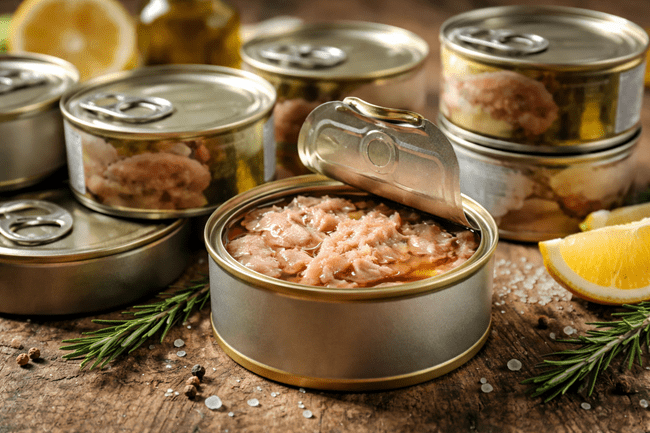Representative image of canned tuna in olive oil. The Genova tuna recall highlights food safety challenges as Tri-Union Seafoods confirms the re-release of previously quarantined products.