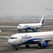 Representative image of grounded passenger aircraft at an Indian airport, illustrating the story on how soaring fuel costs, Gulf airspace disruption, and Directorate General of Civil Aviation schedule cuts are worsening the summer 2026 crisis for Indian airlines.