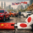 Representative image of Chinese and Japanese passenger vehicles in a Southeast Asian urban market, illustrating how BYD Co. Ltd., Chery Automobile Co. Ltd., and SAIC Motor Corp. Ltd. are challenging Japanese automaker dominance across the ASEAN light vehicle market amid rising electric vehicle and hybrid demand.