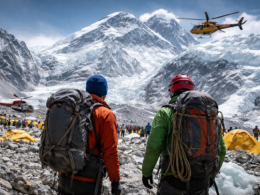 Representative image of Mount Everest Base Camp and helicopter rescue activity, used to illustrate the Nepal Everest insurance fraud case in which guides and operators were accused of staging medical evacuations.