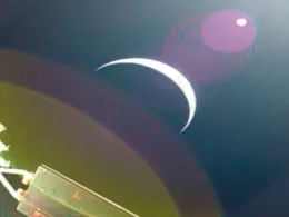 Earth's crescent captured from Orion's solar array camera on day one of NASA Artemis II — the first crewed mission to leave Earth orbit since Apollo 17 in 1972.