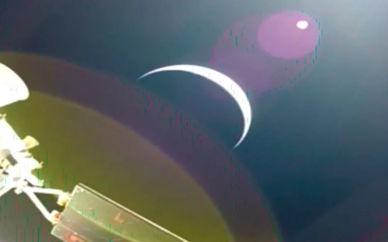 Earth's crescent captured from Orion's solar array camera on day one of NASA Artemis II — the first crewed mission to leave Earth orbit since Apollo 17 in 1972.