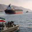 Representative image of commercial shipping and naval activity in the Strait of Hormuz, as Iran reopens the key oil transit route while uncertainty over the United States naval blockade continues.