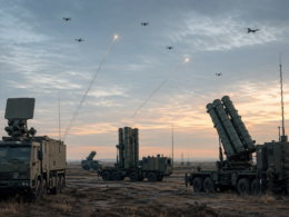 Representative image of mobile air defense systems responding to drone-era threats, highlighting how Leidos Holdings Inc., RTX Corporation and Lockheed Martin Corporation could benefit as militaries expand layered air defense, counter-drone protection and missile defense modernization.
