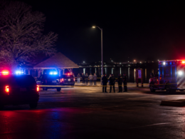 Representative image of emergency vehicles and police activity near a lakeside recreation area, illustrating the Arcadia Lake shooting near Oklahoma City that left multiple people hospitalized and prompted a major public safety investigation.