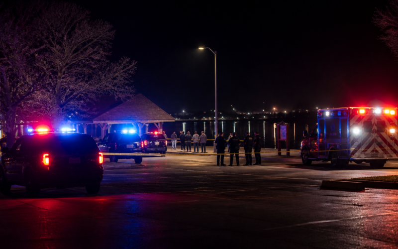 Representative image of emergency vehicles and police activity near a lakeside recreation area, illustrating the Arcadia Lake shooting near Oklahoma City that left multiple people hospitalized and prompted a major public safety investigation.