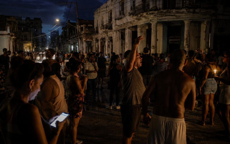 Representative image: Cuba’s partial power grid collapse has intensified blackout pressure across Havana and eastern provinces, with residents gathering in darkened streets as fuel shortages deepen the island’s electricity crisis and trigger fresh protests.
