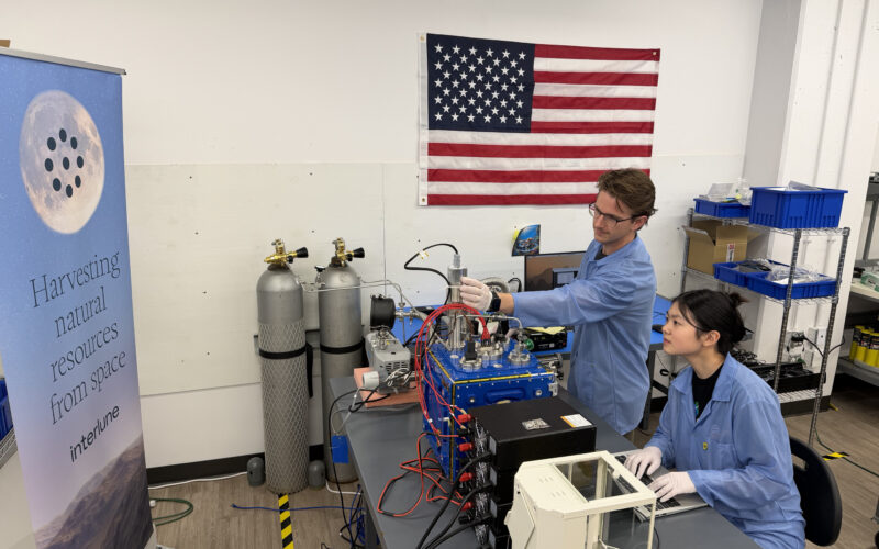 Interlune test engineer Alex Lewandowski and mechanical engineer Jessica Wu check mass spectrometer test equipment in Seattle as NASA’s $6.9 million award pushes lunar helium-3 extraction closer to its first commercial test.