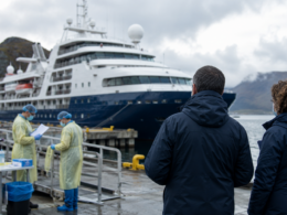 Representative image: Health officials monitor a cruise ship at port as the World Health Organization says the suspected MV Hondius hantavirus cluster does not signal a COVID-style pandemic, keeping focus on Andes virus containment, passenger tracing and global public health vigilance.