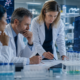 Representative image of oncology researchers reviewing clinical trial data, reflecting Regeneron Pharmaceuticals’ late-stage Libtayo combination setback against Merck’s Keytruda in advanced melanoma.
