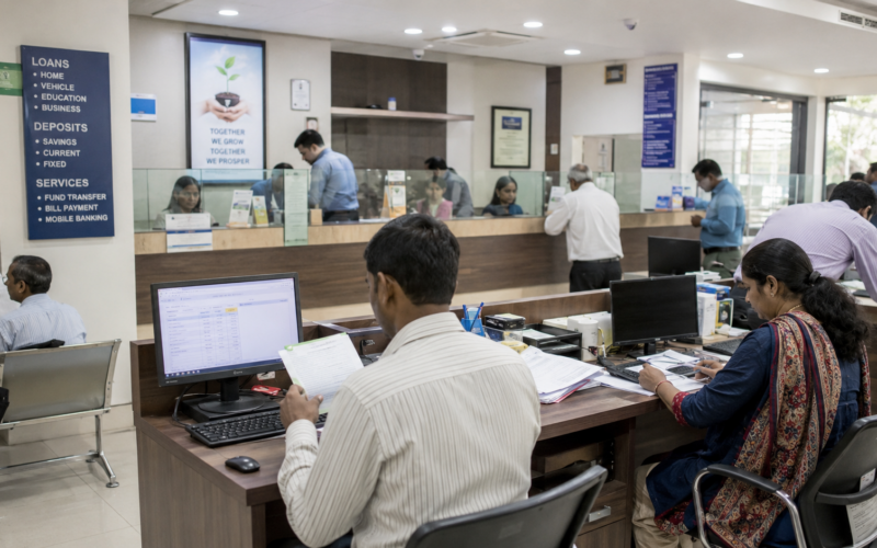 Representative image of an urban co-operative banking branch in India, highlighting how the Reserve Bank of India’s likely restart of fresh UCB licences could reshape local credit access, financial inclusion and banking regulation.