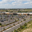 Representative image: A modern retail property in Texas reflects Stratus Properties’ $46.5 million Jones Crossing sale to Brixmor, which generated $21.7 million in net cash and advanced the company’s liquidation strategy.
