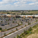 Representative image: A modern retail property in Texas reflects Stratus Properties’ $46.5 million Jones Crossing sale to Brixmor, which generated $21.7 million in net cash and advanced the company’s liquidation strategy.