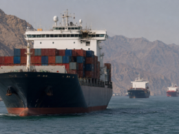 Commercial ships navigate the Strait of Hormuz as the United Nations pauses its vessel evacuation plan following the Ever Lovely attack near Oman, renewing concerns over Iran-linked maritime risks and global energy shipping disruption. Representative image.