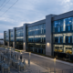 Representative image: A modern data centre campus with power infrastructure illustrates how Broadcom, Apollo and Blackstone’s AI XPV Platform could reshape AI compute financing, semiconductor demand and large-scale artificial intelligence infrastructure deployment.