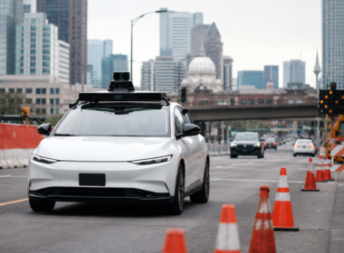 Representative image of a self-driving robotaxi near a construction zone, reflecting how Waymo’s recall has renewed questions about autonomous vehicle safety, freeway operations and regulatory scrutiny.