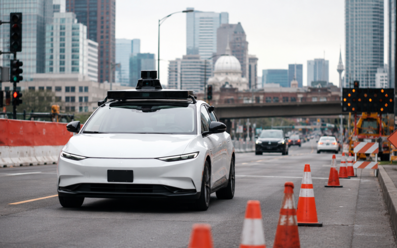 Representative image of a self-driving robotaxi near a construction zone, reflecting how Waymo’s recall has renewed questions about autonomous vehicle safety, freeway operations and regulatory scrutiny.