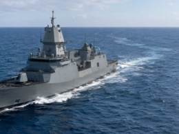 A modern naval frigate deploys a towed passive sonar array for anti-submarine warfare, reflecting OKI’s supply contract with Mitsubishi Heavy Industries for Australia’s new general-purpose frigates. Representative image.