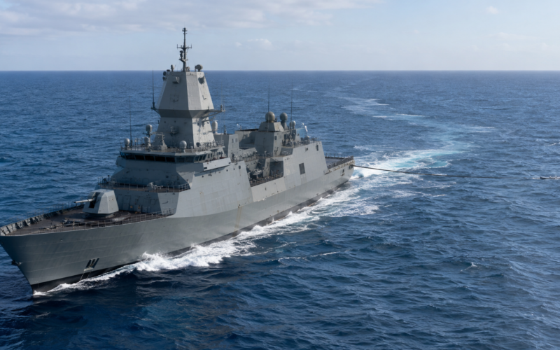A modern naval frigate deploys a towed passive sonar array for anti-submarine warfare, reflecting OKI’s supply contract with Mitsubishi Heavy Industries for Australia’s new general-purpose frigates. Representative image.