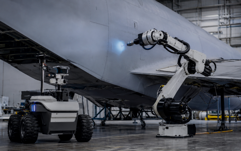 Autonomous robotic systems perform aircraft maintenance as Palladyne AI secures a $2.9 million U.S. Air Force contract expansion, taking the program above $10.6 million. Representative image.