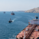 Representative image of oil tankers navigating the Strait of Hormuz as the International Maritime Organization urges countries to reject Iran’s claims over the critical shipping route.