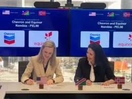 Beatrice Bienvenu, left, Country Manager Namibia for Chevron, and Aynur Rzayeva, Namibia Asset Manager for Equinor, sign the agreement in Windhoek as Equinor enters Namibia with a 17.4% stake in Chevron-operated PEL 90 ahead of the Orange Basin’s next drilling catalyst. Photo: Fabio Pezzotti.