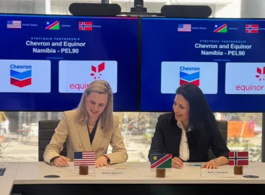 Beatrice Bienvenu, left, Country Manager Namibia for Chevron, and Aynur Rzayeva, Namibia Asset Manager for Equinor, sign the agreement in Windhoek as Equinor enters Namibia with a 17.4% stake in Chevron-operated PEL 90 ahead of the Orange Basin’s next drilling catalyst. Photo: Fabio Pezzotti.