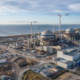 Coastal nuclear power plant construction site in the UK, illustrating how the £38.2bn Sizewell C Nuclear Project in Suffolk aims to deliver 3.2GW of low-carbon electricity by its 2039 operating baseline. Representative image.