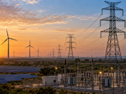 High-voltage transmission lines, substations, solar farms and wind turbines illustrate the grid infrastructure challenge behind India’s energy transition, as the Ministry of Power identifies more than ₹9.15 lakh crore of investment opportunities to expand transmission capacity through 2032. Representative image.